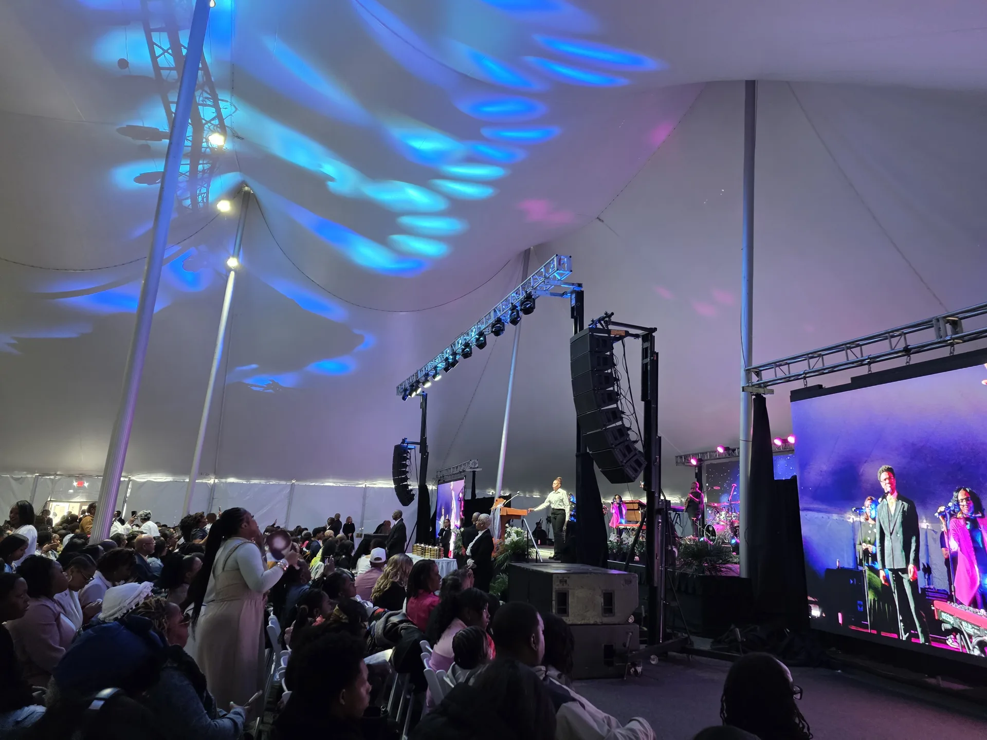 Concert lighting and stage production inside a high tension fabric tent rental